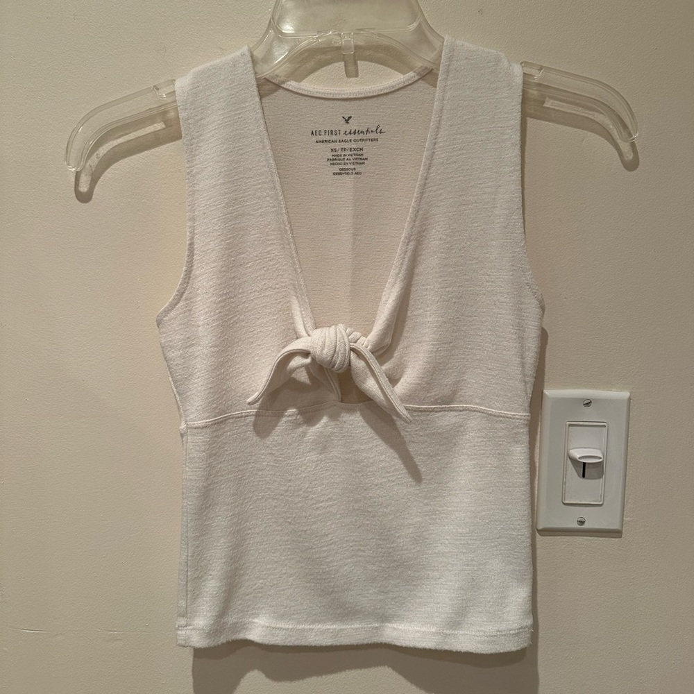 White tank with knot accent